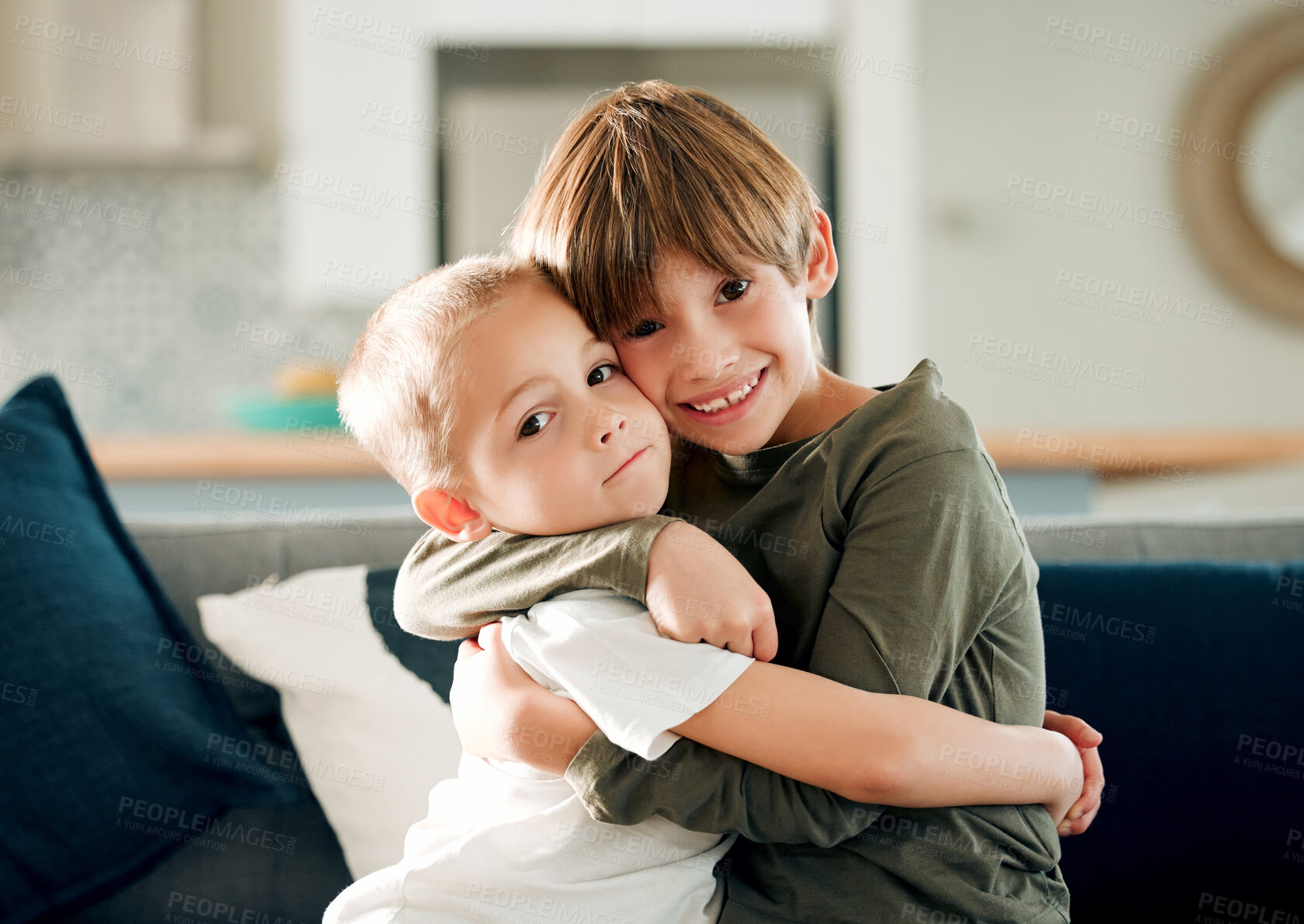 Buy stock photo Happy boy, portrait and siblings with hug on sofa for love, support or embrace for brother at home. Little children, kids or youth with smile for childhood, weekend or bonding on holiday at house