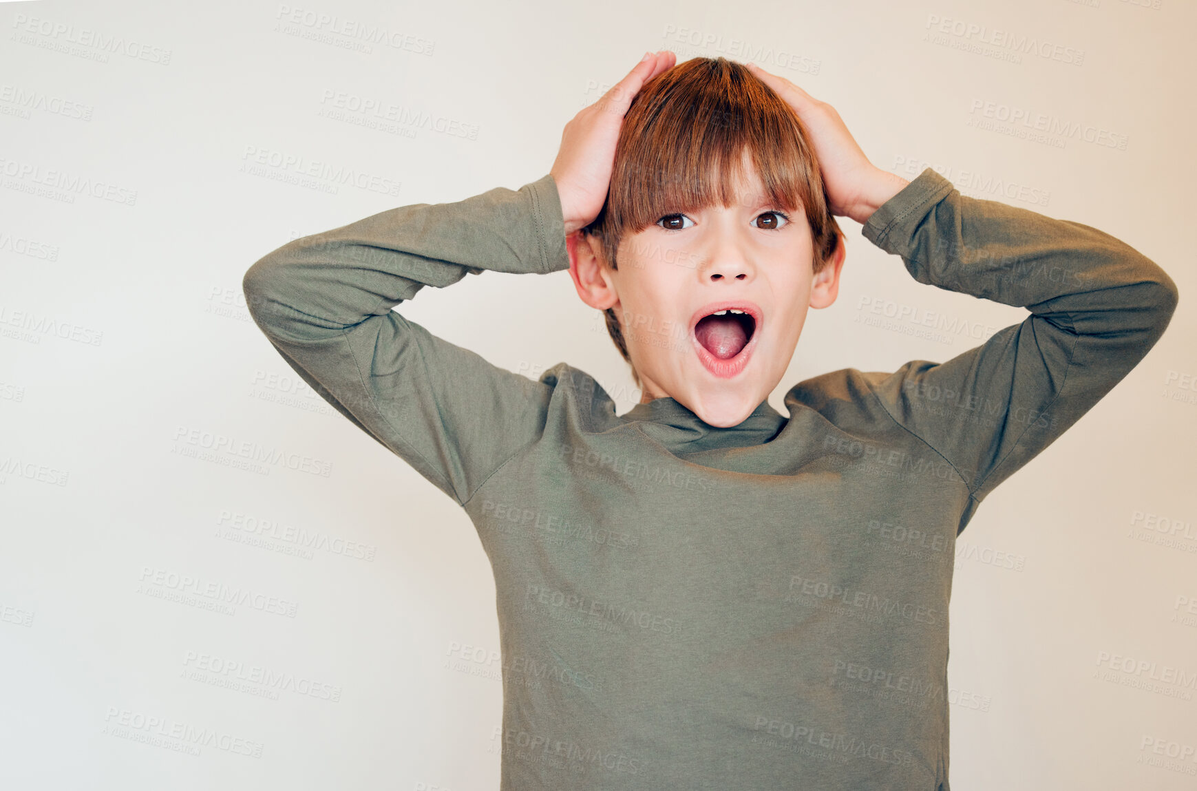 Buy stock photo Surprise, portrait and child in home with wow, happy and crazy emoji gesture by white wall. Young boy, good news and gossip and excited with open mouth, omg and mind blown from deal announcement 