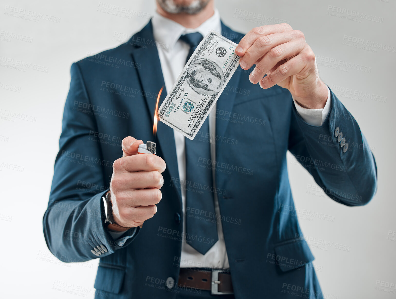 Buy stock photo Business, man and burning money in studio on white background for economy or dollar collapse. Male person, hands and banknotes with fire for financial crisis, bankruptcy and inflation increase