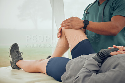 Buy stock photo Cropped shot of an unrecognizable male physiotherapist working on a female patient outside