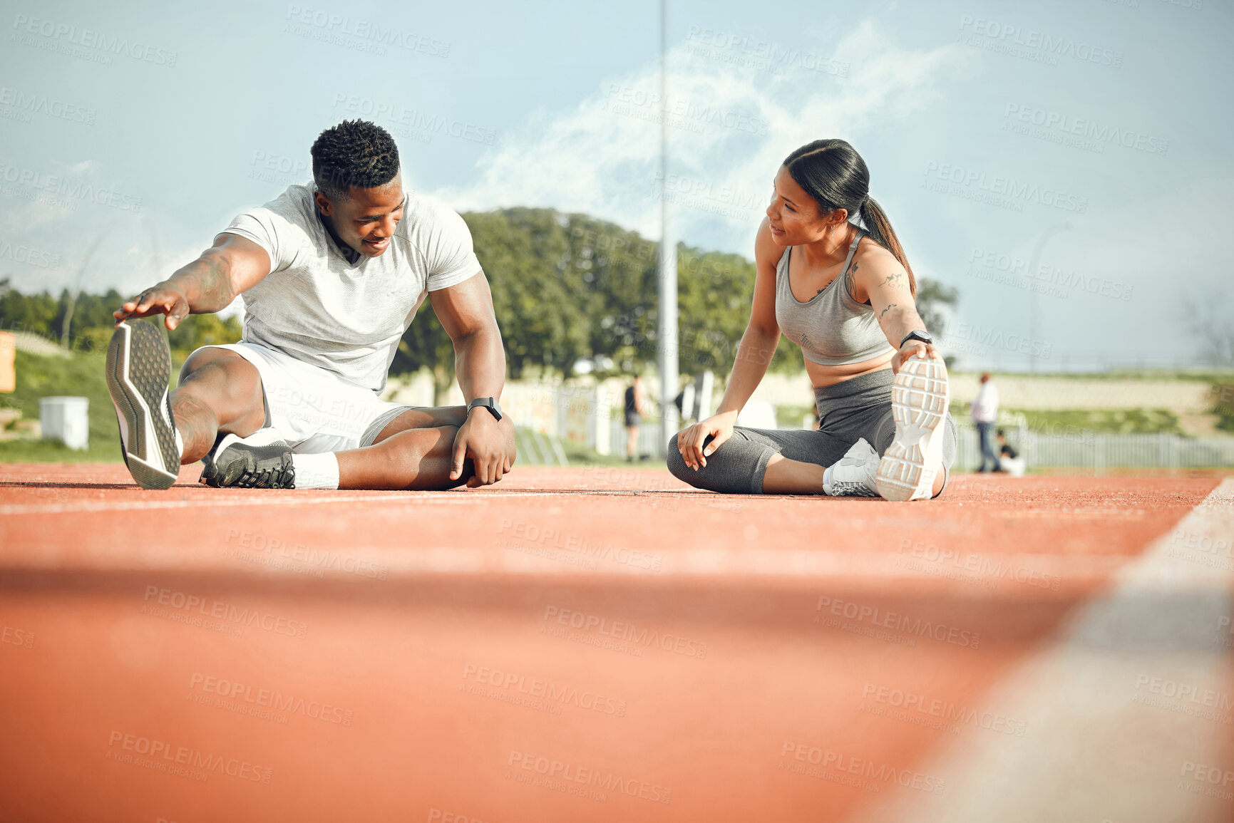 Buy stock photo Woman, man and stretching for fitness, workout and running on track or arena together. Athlete, personal trainer and people for cardio, exercise and outdoor with wellness and commitment for sports