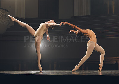 Buy stock photo Shot of a group of ballet dancers practicing a routine on stage