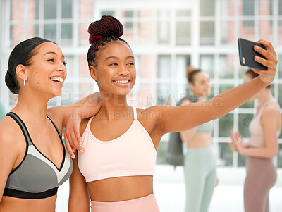 Buy stock photo Shot of two women taking a selfie together