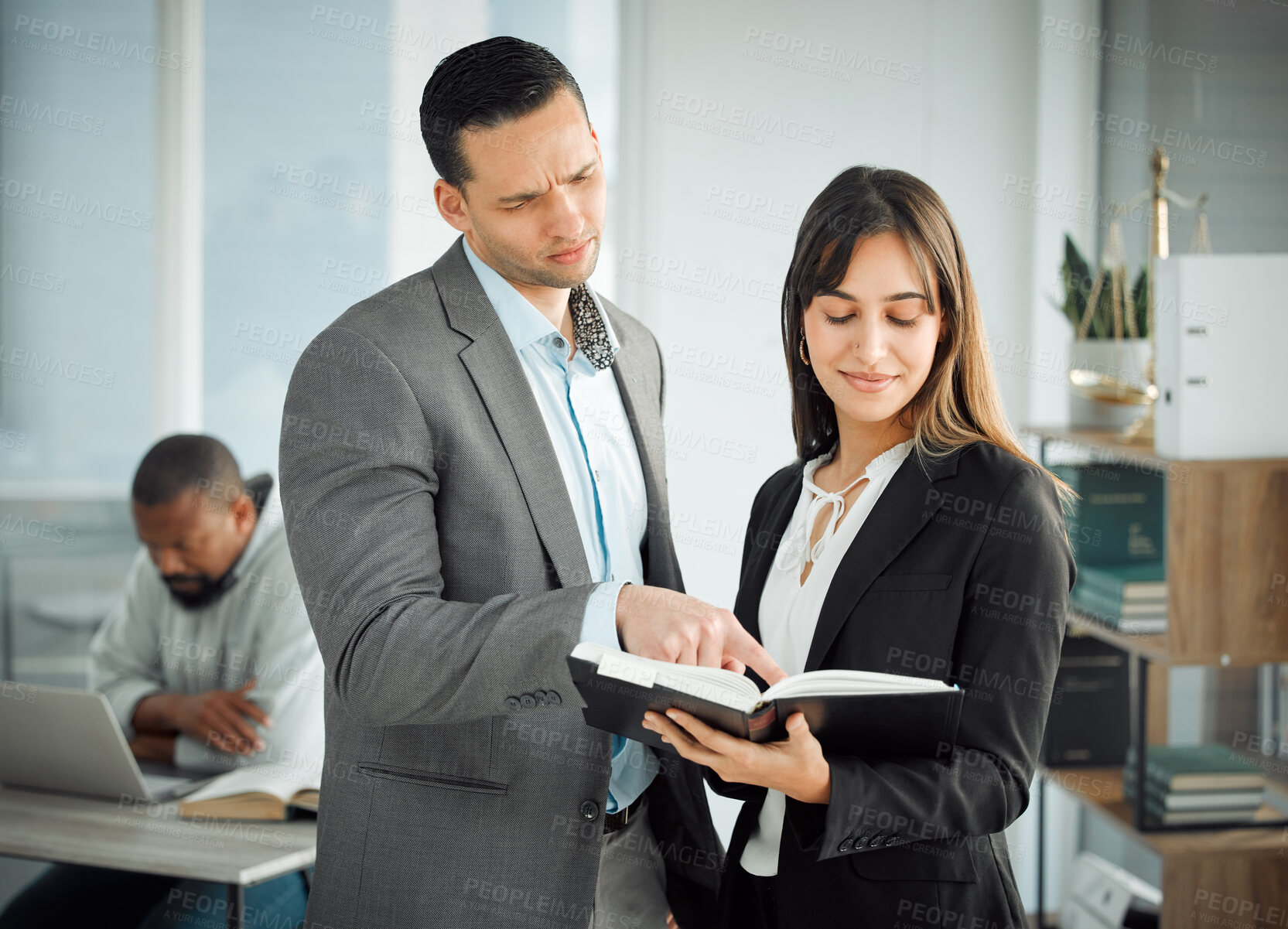 Buy stock photo Shot of two businesspeople working together