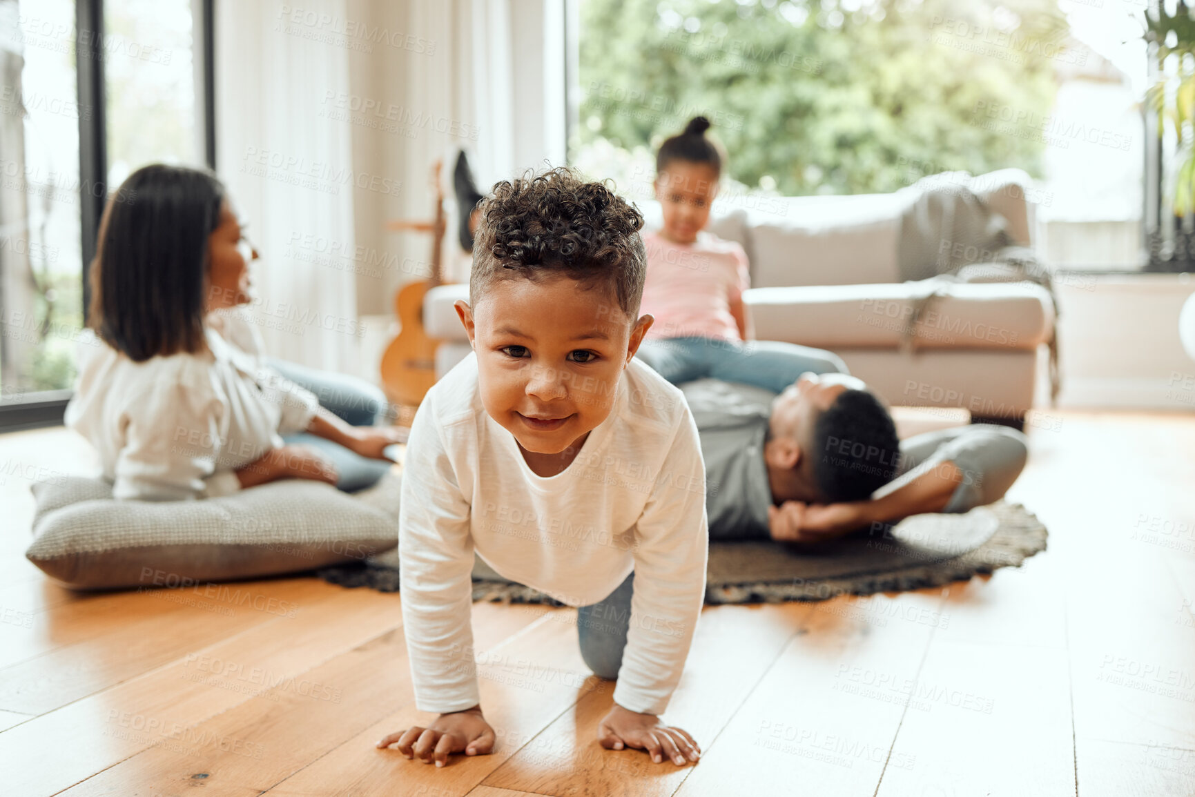 Buy stock photo Portrait, boy and kid with family on floor in home living room together for bonding, love and relax. Face, parents and children with mother, father or siblings playing on carpet for healthy childhood