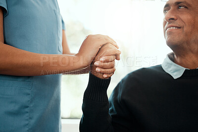 Buy stock photo Cropped shot of a nurse holding an older mans hand