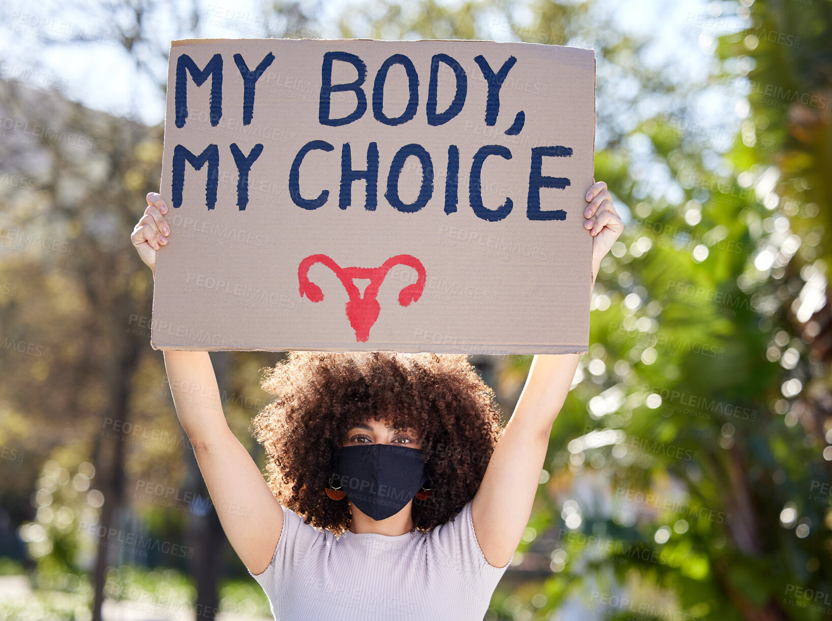 Buy stock photo Woman, portrait and poster for outdoor protest on abortion, body choice or freedom of human rights. Feminism, cardboard and female person with mask for equality, political change or safe decision