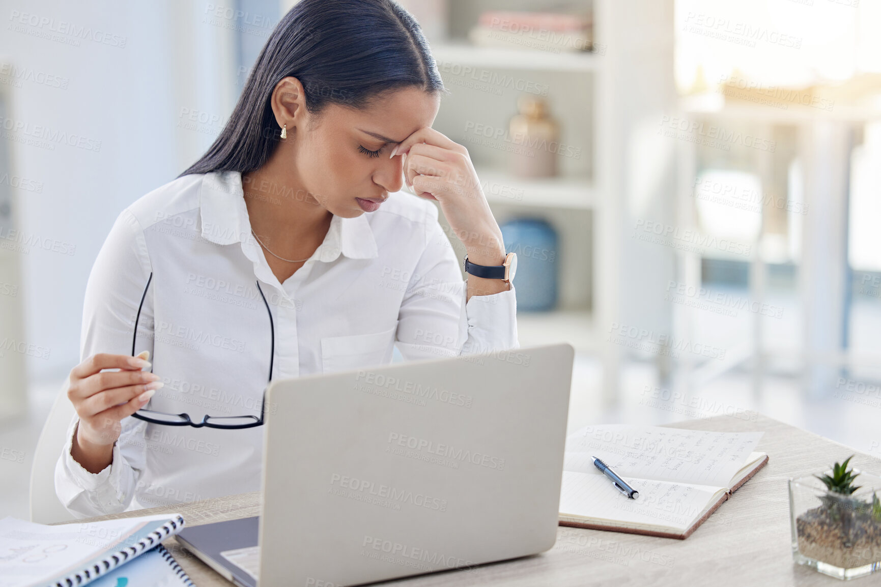 Buy stock photo Headache, laptop and business woman with glasses in office for editing report, burnout or project deadline. Fatigue, stress and tired journalist, editor or female employee at desk for news agency