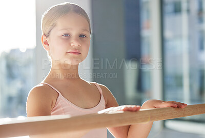 Buy stock photo Shot of a little girl practicing ballet in a dance studio