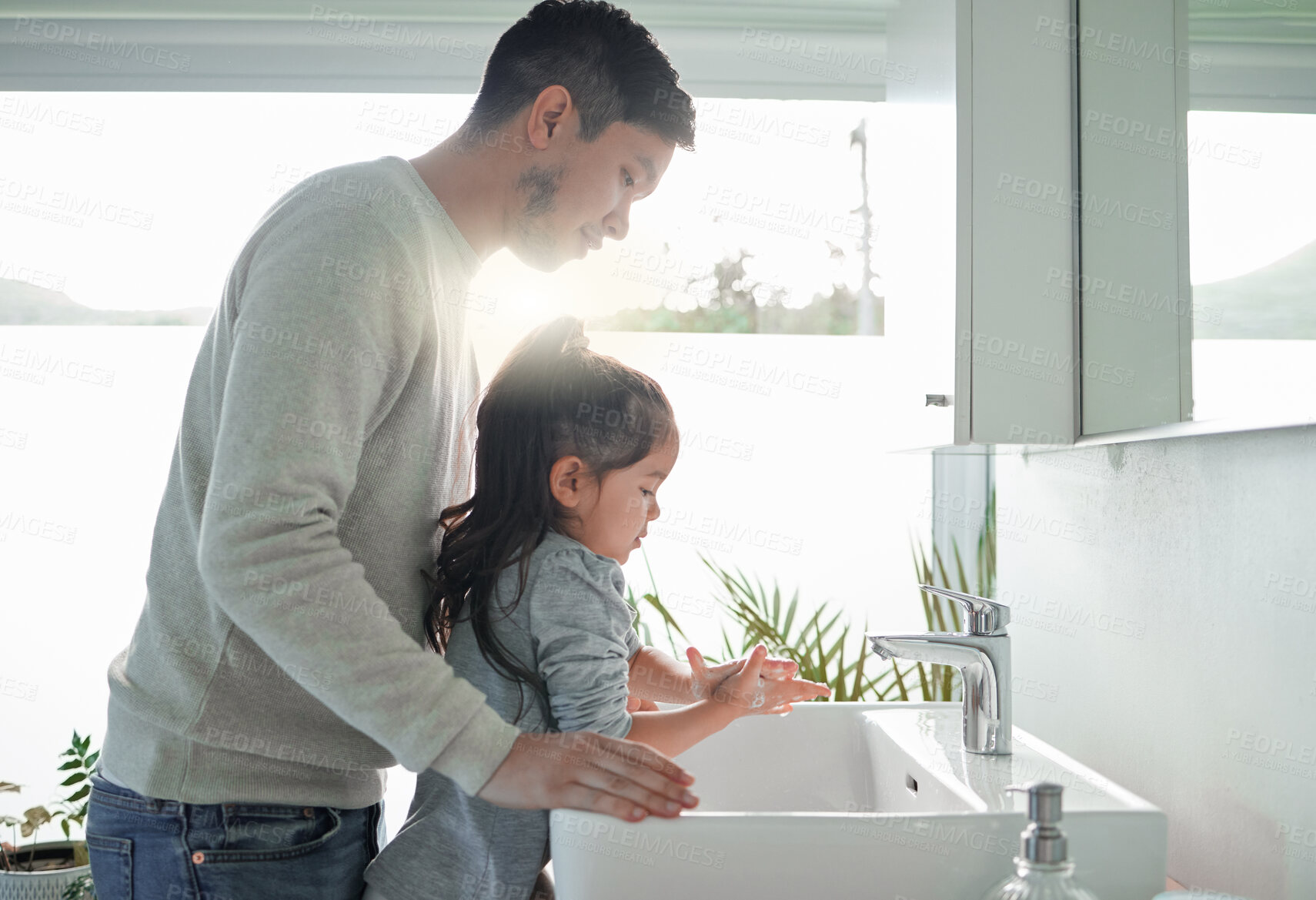 Buy stock photo Family, dad and washing hands with girl in home for health, development and soap for bacteria or dirt removal. Young kid, papa and palm with foam for cleaning, teaching hygiene and growth in bathroom