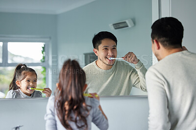 Buy stock photo Family, girl and dad with brushing teeth by mirror for learning hygiene, growth and teaching gingivitis prevention in home. Kid, papa and reflection with tooth cleaning, development and healthy gums