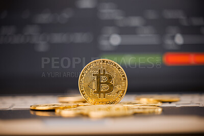Buy stock photo Shot of a few gold coins on a table