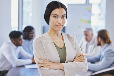 Buy stock photo Shot of a beautiful young businesswoman standing in the boardroom