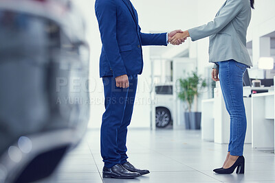 Buy stock photo Closeup, man and woman with handshake, collaboration and customer with negotiation, car dealership and selling. Zoom, business people or client shaking hands, agreement and professional with contract