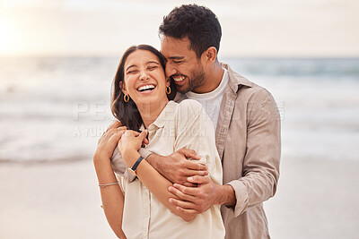 Buy stock photo Together, beach and happiness with hug on holiday for having fun with sunset for the weekend. Couple, vacation and laughing with face at the ocean for travel in the summer for a relaxing time.