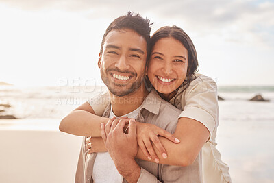 Buy stock photo Portrait, hug and couple at the beach with happiness for a vacation in the summer having fun. Together, hugs and ocean for holiday with smile for the weekend with sunshine for relaxing and bonding.