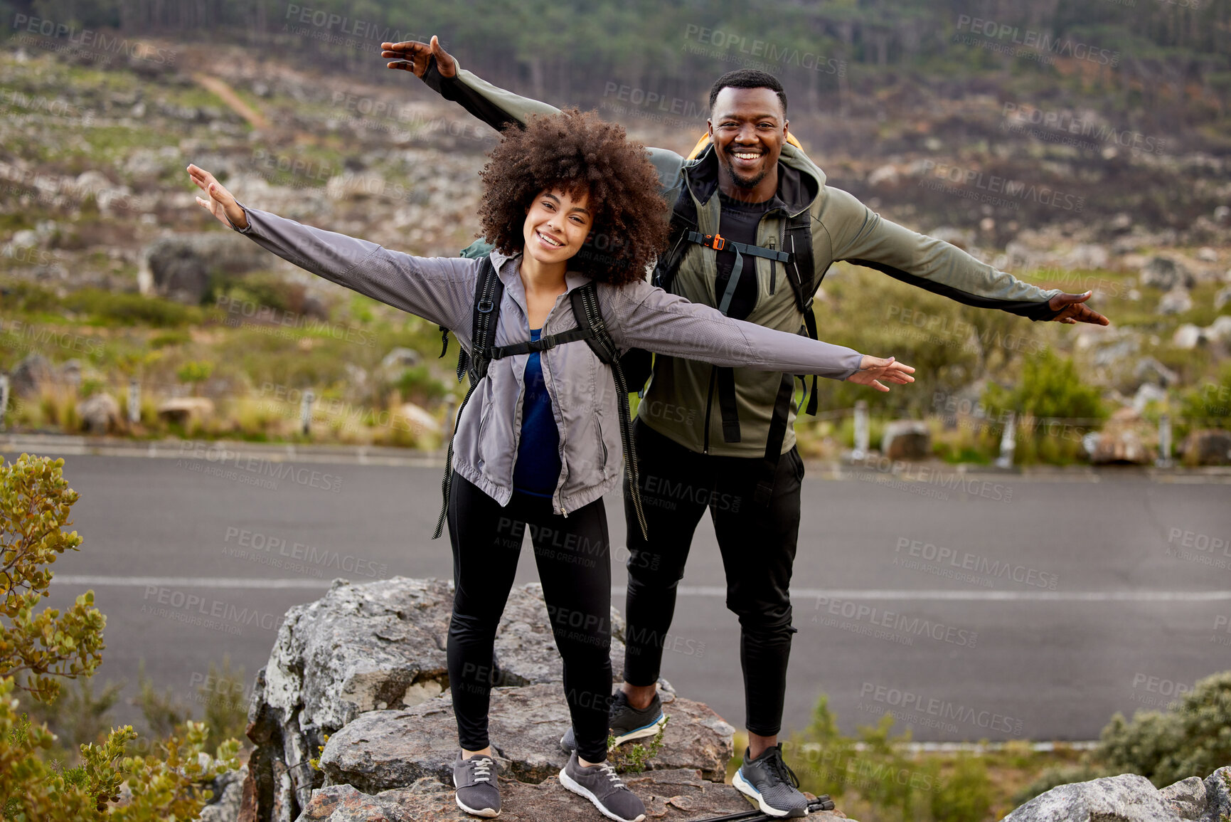 Buy stock photo Couple, hiking or outdoor in portrait together for fitness, journey or climbing and travel. Relax, trekking and mountain range with black man and woman hiker in nature for exercise and health