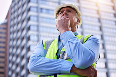 Buy stock photo Mature, man and architect thinking in city, ideas or inspiration at construction site for engineering. Renovation decision, property development and vision for urban infrastructure with low angle