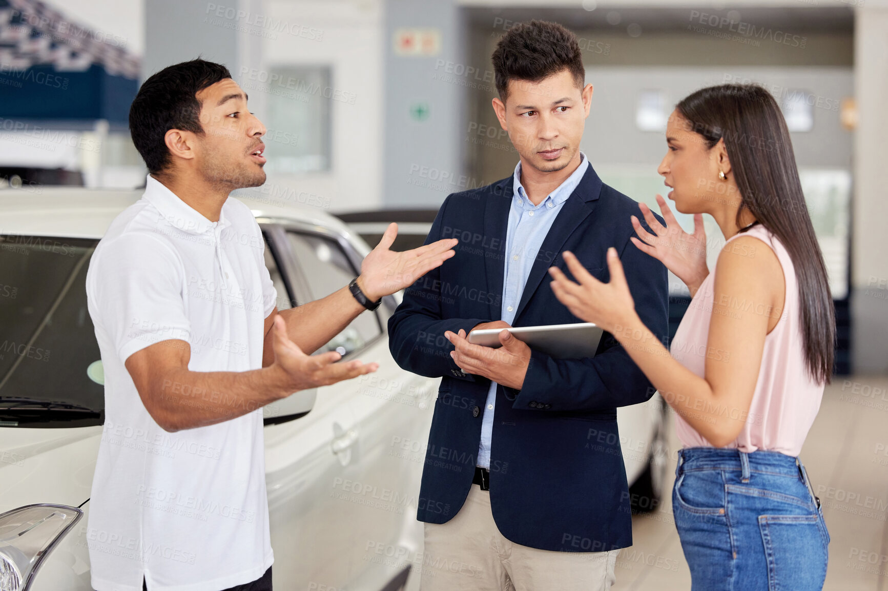 Buy stock photo Couple, car dealership and stress with argument in discussion for and motor vehicle, finance and problem. Angry, man and woman with communication in showroom for automobile, purchase and conflict