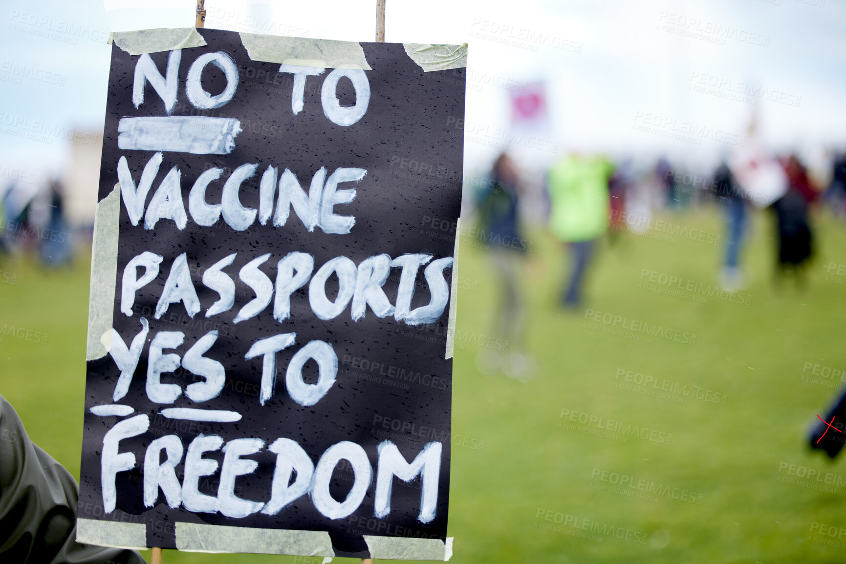 Buy stock photo Outdoor, poster and protest of vaccine, sign and community with riot against government and campaign. Society, activist and rally for opposition of health passport, right and Covid 19 in France