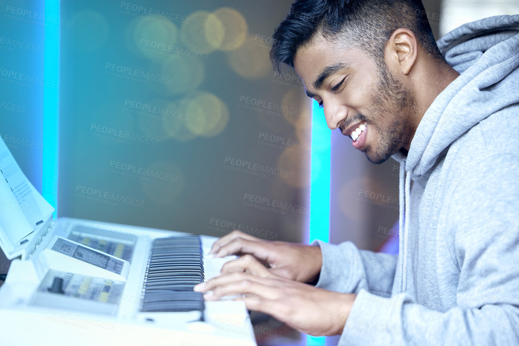 Buy stock photo Indian man, music and happy with keyboard or instrument for skill practice, talent and passion. Musician, rehearsal and smile or satisfied with career growth, piano and confident for performance