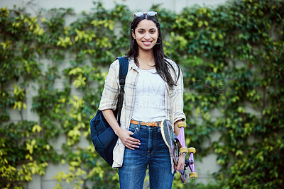 Buy stock photo Portrait, university and woman on campus with skateboard for education, learning and knowledge. Student, skater and person with backpack for happiness, scholarship or confidence on school ground