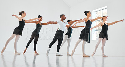 Buy stock photo Shot of a group of young ballet dancers practicing their routine in a dance studio