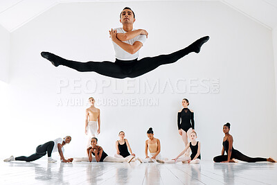 Buy stock photo Full length shot of a diverse group of ballet students rehearsing in their dance studio