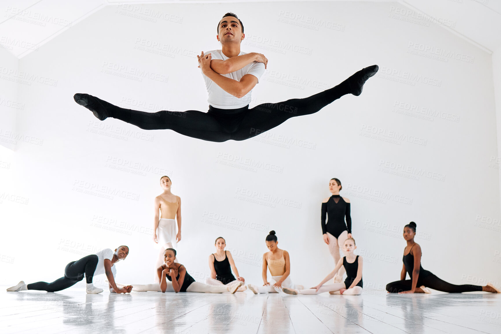 Buy stock photo Ballet, jump and group in training with practice for performance art, elegance or learning. Diversity, ballerina and students with demonstration in class for dancing academy, teamwork and balance