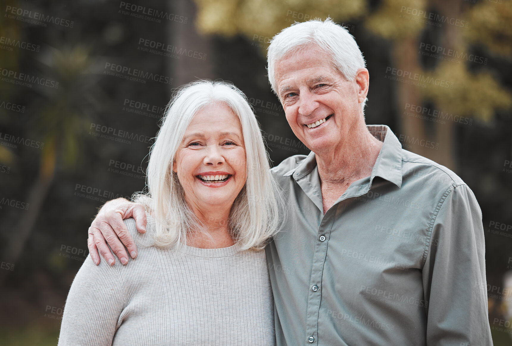 Buy stock photo Old couple, portrait and outdoor hug in retirement, love and affection for spouse on holiday. Elderly people, happy and vacation for bonding in nature, embrace and countryside security in commitment