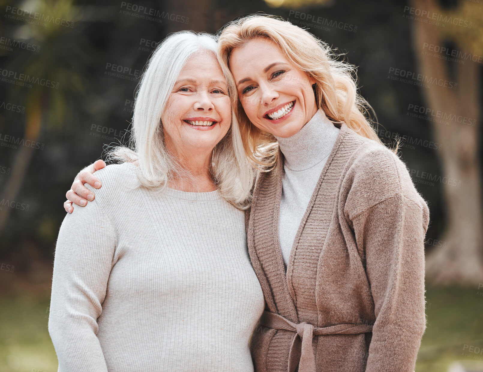 Buy stock photo Portrait, woman and senior mom in backyard with smile, pride and embrace in outdoor bonding together. Happy family, generation and face of elderly mother with daughter in garden for hug, care or love