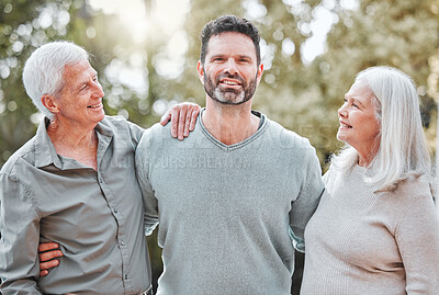 Buy stock photo Portrait, man and senior parents in garden with smile, embrace and care with outdoor bonding together. Elderly mother, father and adult son in backyard with hug, support and love for happy family