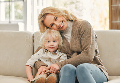 Buy stock photo Shot of a mature mother enjoying time with her son at home