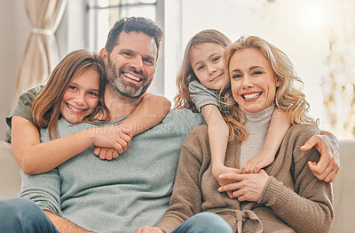 Buy stock photo Shot of a family relaxing together at home