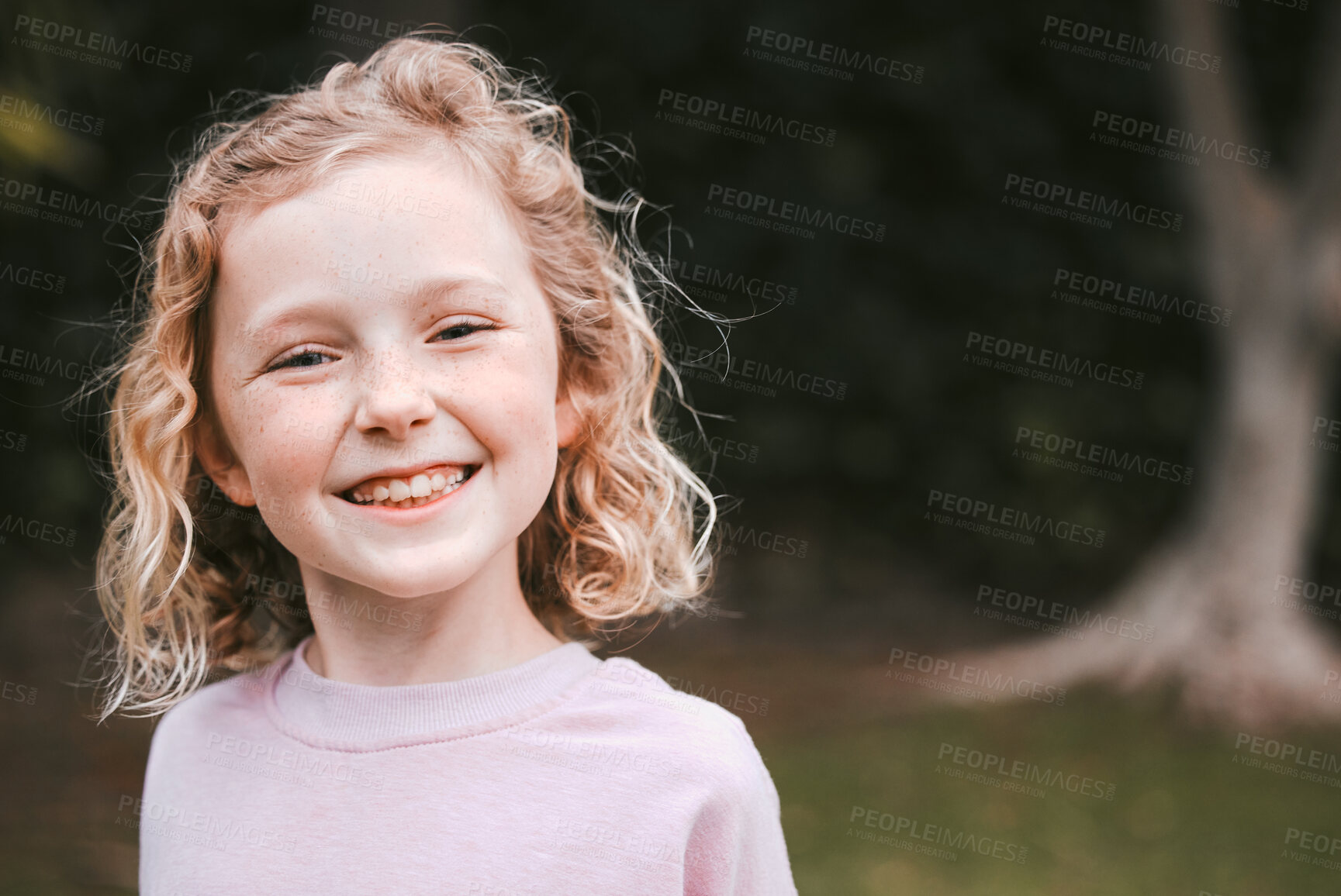 Buy stock photo Shot of an adorable little girl having fun in a garden