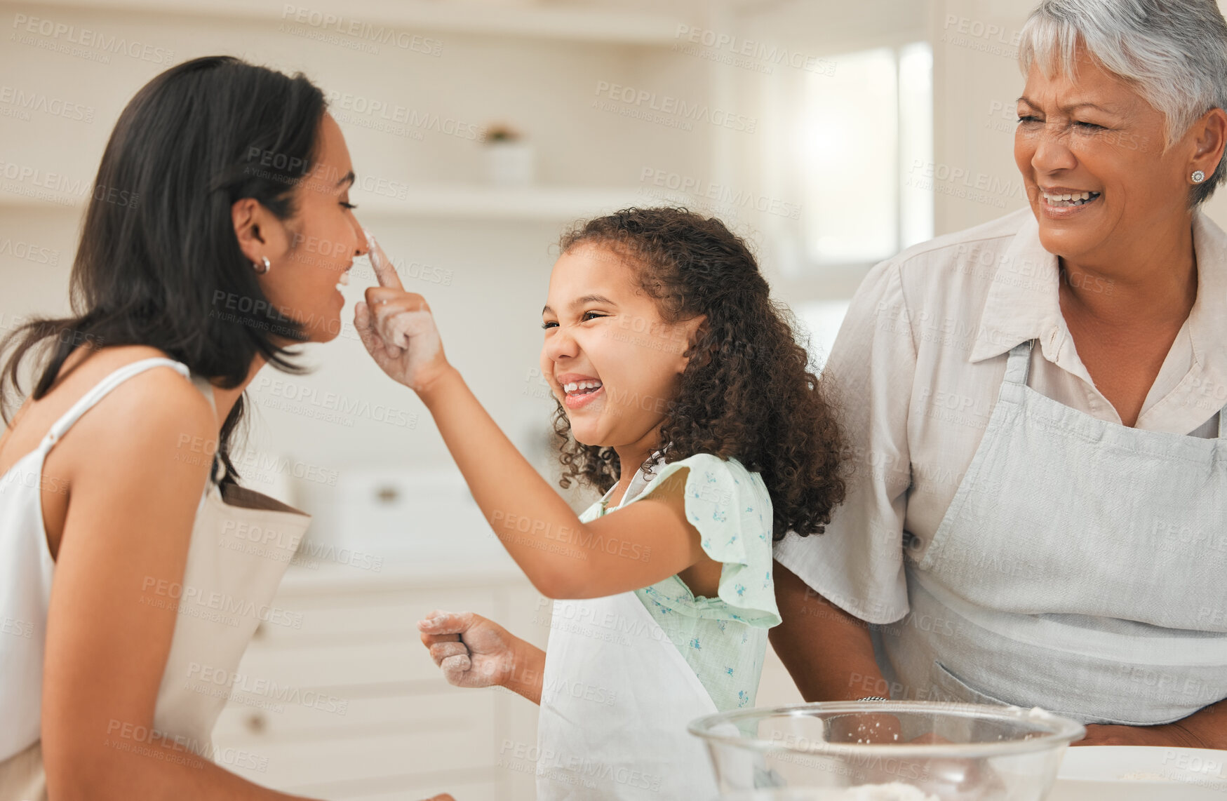 Buy stock photo Baking, playful and child with mom and grandma with flour for cake, cupcakes and desserts in kitchen. Family home, generation and happy mother, grandmother and girl with ingredients, recipe and food