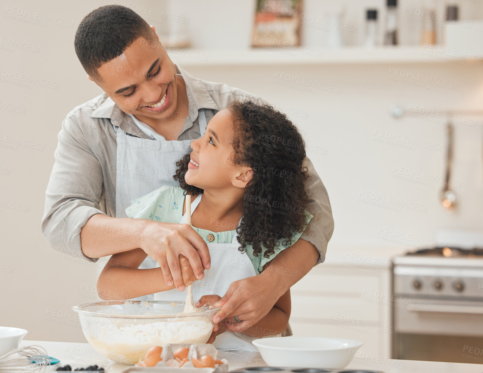 Buy stock photo Teaching, child and father with baking in kitchen for helping, support and learning cake recipe in home. Happy family, man and girl kid with ingredients preparation for cooking education and bonding