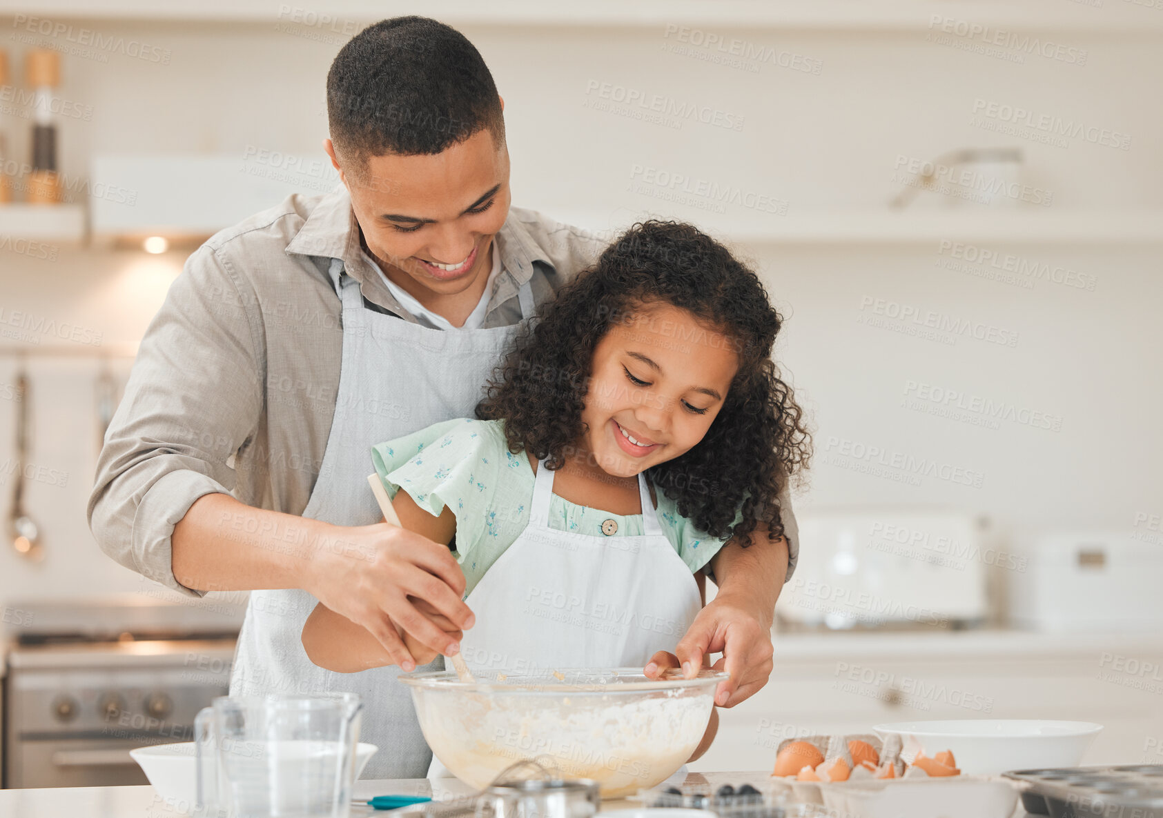 Buy stock photo Learning, child and father with baking in kitchen for helping, support and teaching cake recipe in home. Happy family, man and girl kid with ingredients preparation for cooking education and bonding