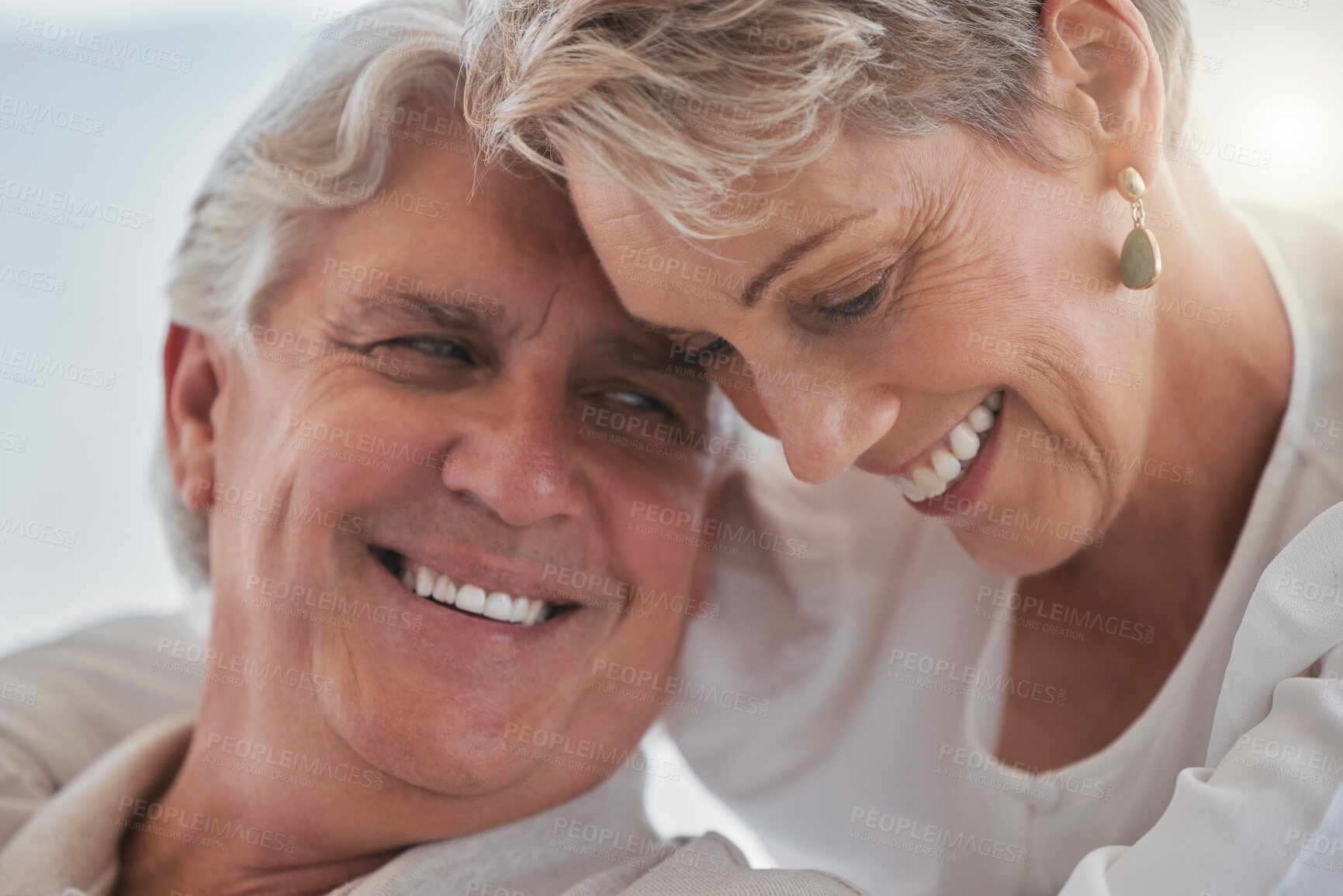 Buy stock photo Senior couple, hug and relax in home with love for bonding, date or relationship together with support. Man, woman and marriage with happiness and smile in retirement for loyalty, care and commitment