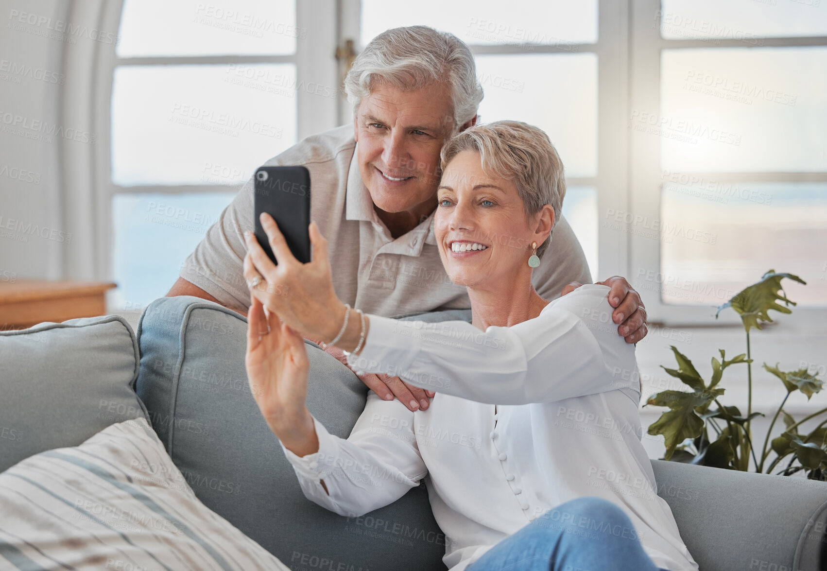 Buy stock photo Selfie, relax and senior couple on sofa for social media post, memory and profile picture. Retirement, marriage and mature man and woman on video call for bonding, love and online in living room