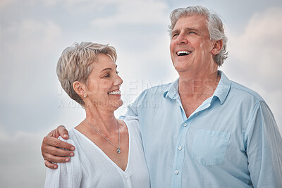 Buy stock photo Funny, hug and outdoor with senior couple, smile and retirement with happiness, coast and love. Laughing, humor and man with woman, marriage and relationship with romance, embrace and weekend break