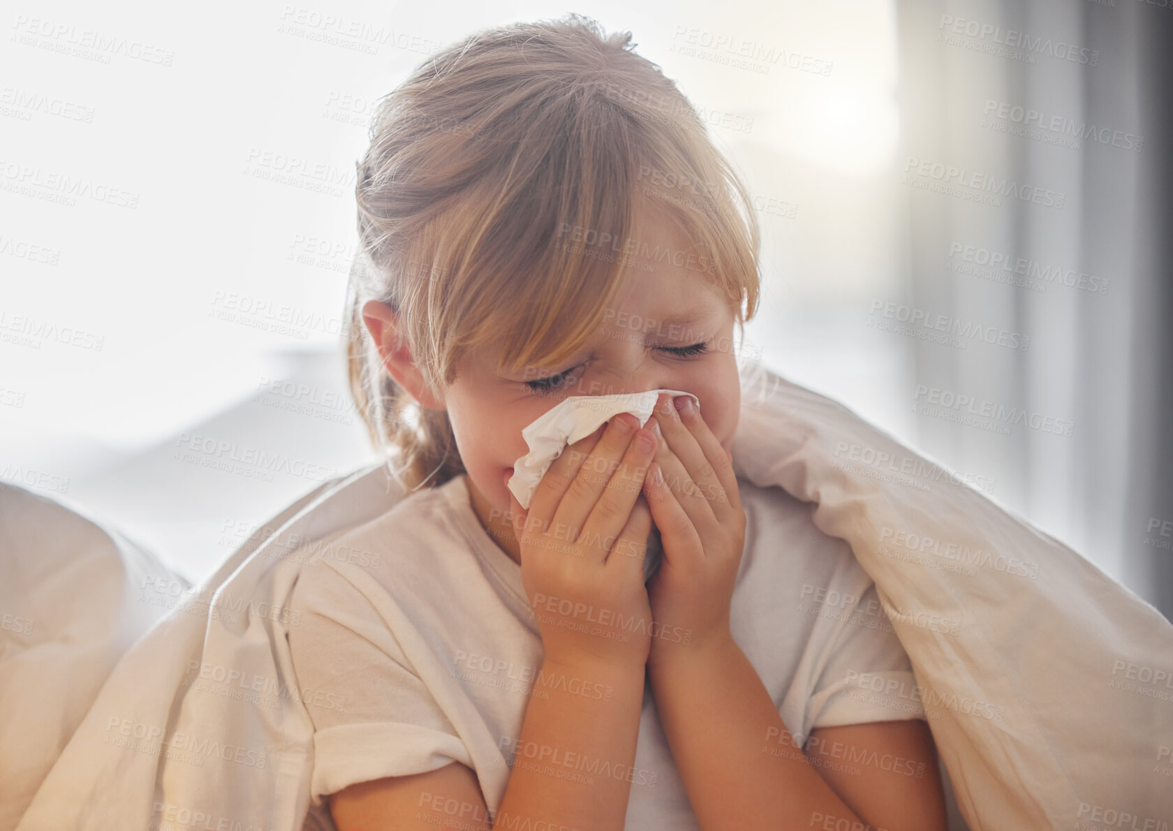 Buy stock photo Child, sneezing and sick with tissue in bedroom for bacteria, sinusitis and viral infection. Kid, cold and girl blowing nose with paper at home for medical illness, flu virus and germs of congestion