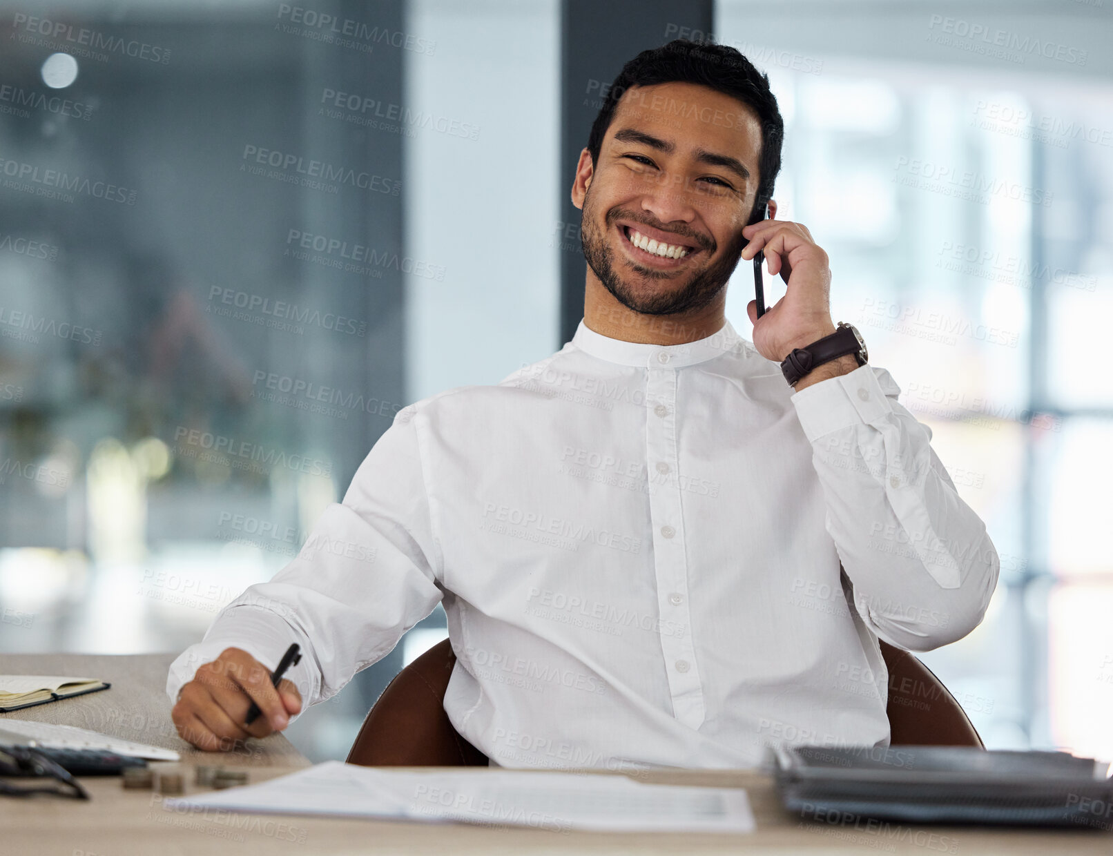 Buy stock photo Man, phone call and happy for portrait in office with conversation, paperwork or negotiation for agreement. Person, smartphone and smile for networking, listen or news for funding at finance agency