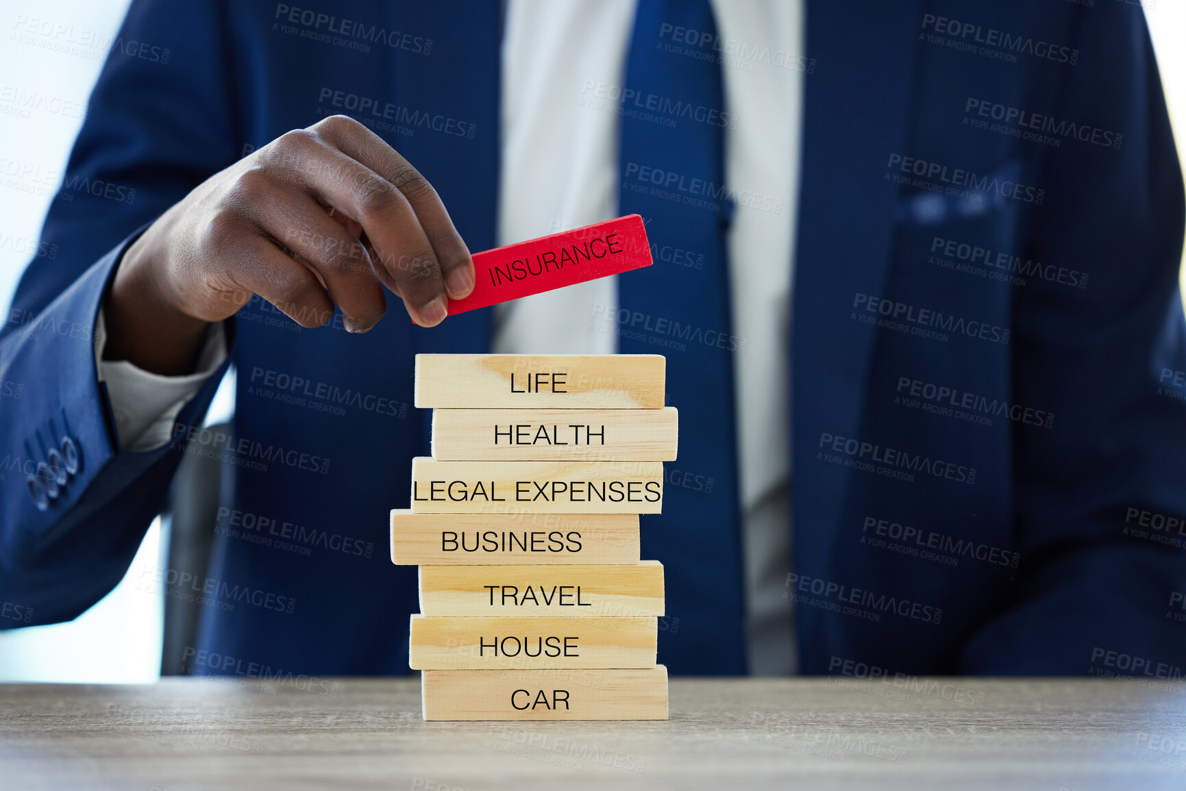 Buy stock photo Hands, insurance and agent with wood blocks for safety, healthcare or car protection. Business security, person and assurance closeup with words for legal expenses, travel or life cover on home desk