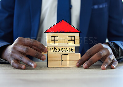 Buy stock photo Hands, building and paper symbol for insurance broker, security or asset protection in modern office. Person, agent and cardboard for house, property or icon for risk cover for real estate at company