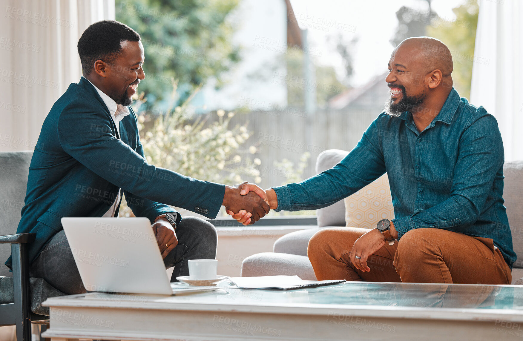 Buy stock photo Broker, handshake and black man in a house with a client for meeting or consultation for agreement. Financial advisor shaking hands with happy person for investment, savings budget or insurance deal