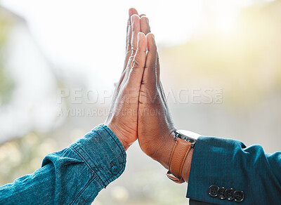 Buy stock photo Shot of two businessmen high fiving one another