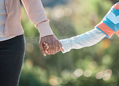 Buy stock photo Parent, child and holding hands outdoor for safety, protection and family love closeup. Kid, people and fingers in nature for support, security and bonding together with care or connection on holiday