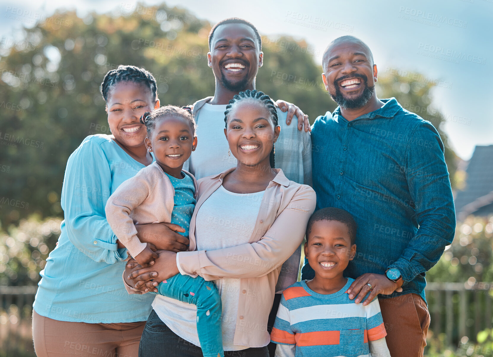 Buy stock photo Generations, black family and happy in garden on portrait for gathering, visit and bonding in Uganda. People, love and support with smile in confidence for care, trust and unity on break at home