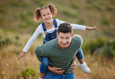 Buy stock photo Shot of an adorable little girl spending the day outdoors with her father